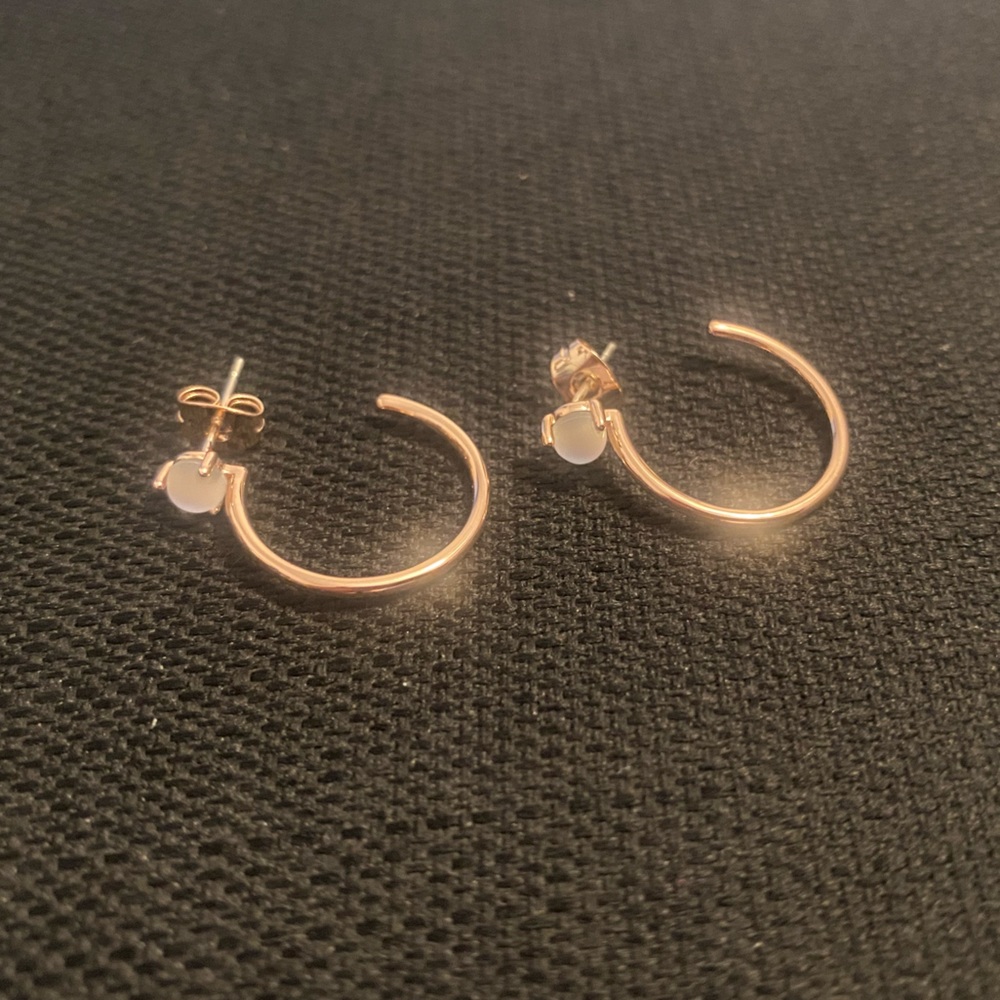 Pura Vida rose gold earrings with moonstone gem